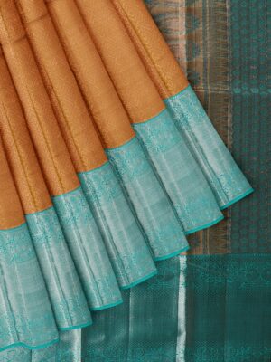 Copper saree with turquoise blue border