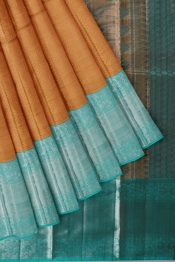 Copper saree with turquoise blue border