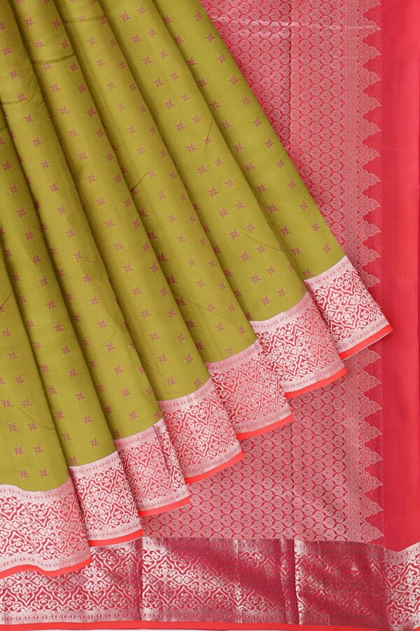Green saree with pink and silver border