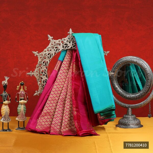 Turquoise Blue Saree With Red Border