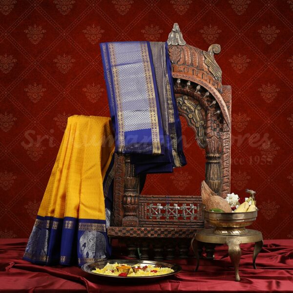 Yellow Saree With Dark Blue Border