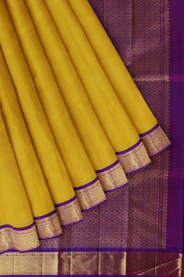 Yellow Saree with Purple Border
