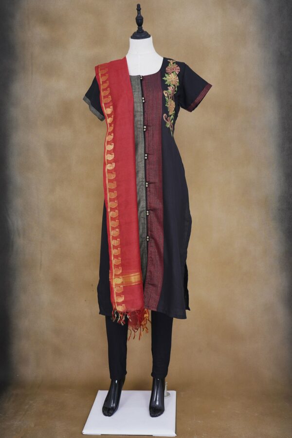 Black floral design top with black and red shawl