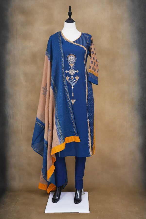 Blue design top with blue bottom and beige shawl kurti