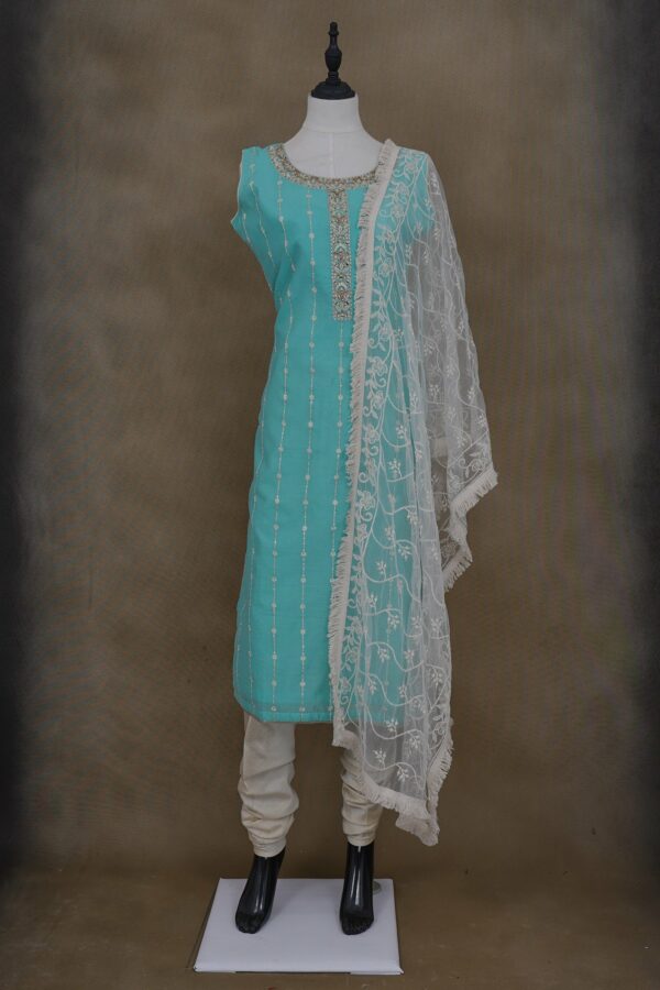 Blue top with white bottom and netted shawl kurti