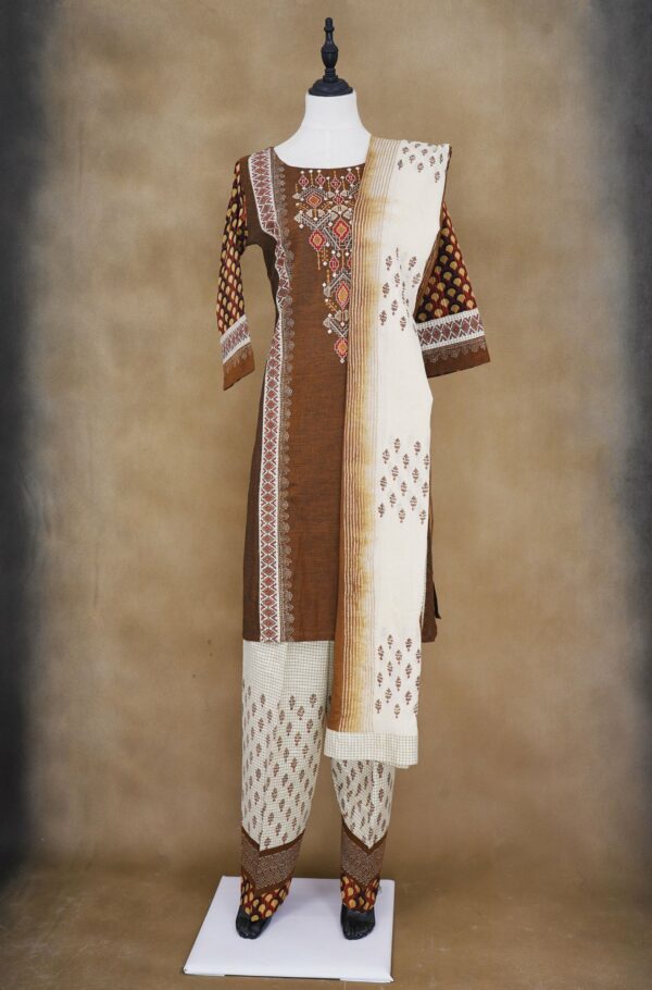 Brown deisgn top with checked white bottom and white and shawl kurti
