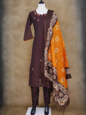 Brown floral top with brown bottom and orange shawl