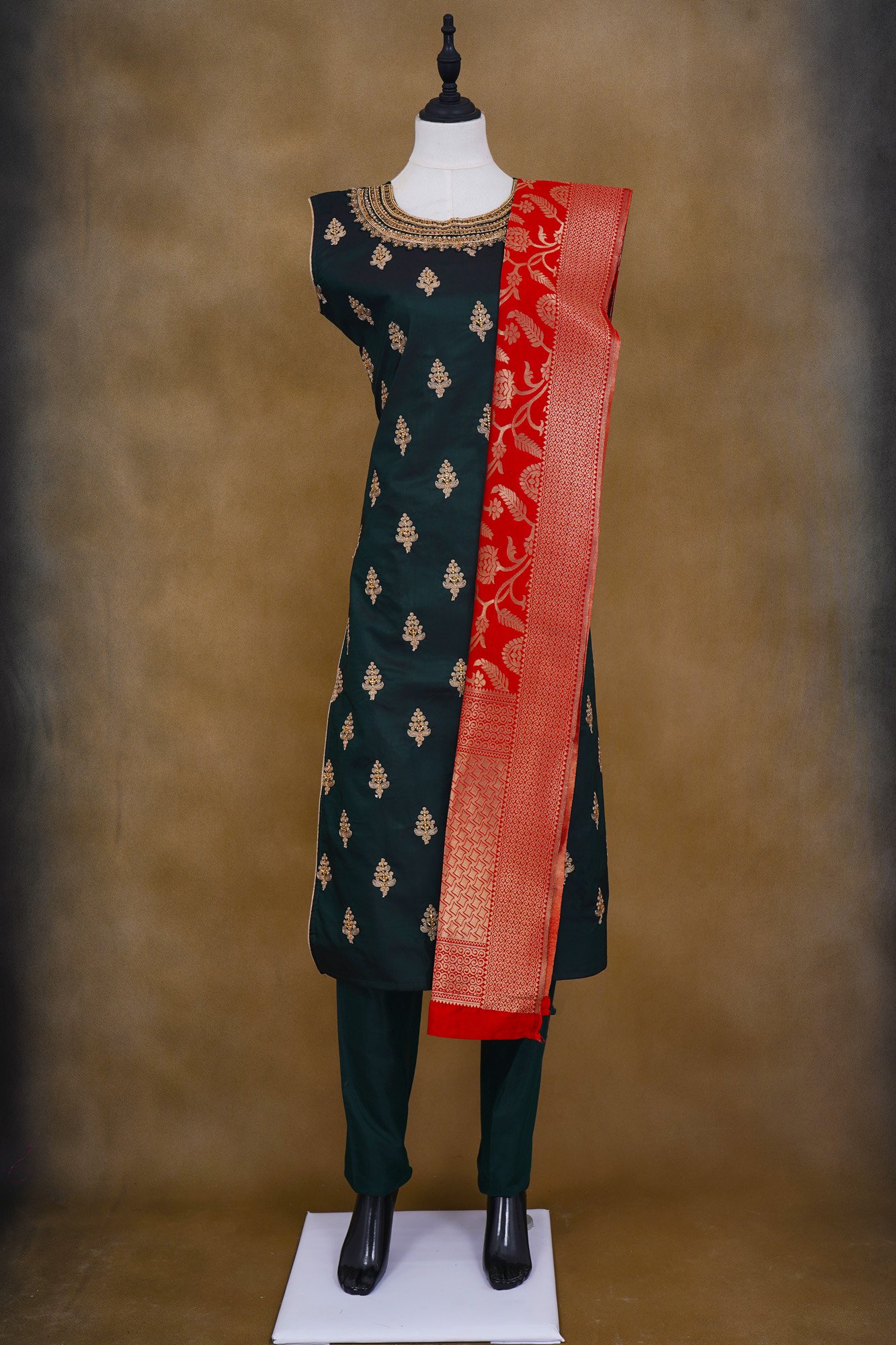 Dark green top with dark green bottom and red shawl kurti