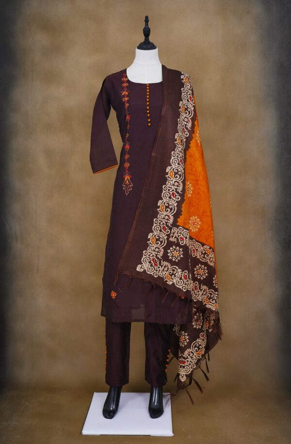 Dark maroon top with dark maroon bottom and brown orange shawl kurti