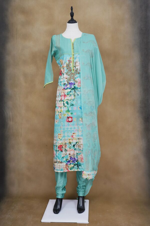 Light blue floral top with light blue bottom and light blue shawl kurti