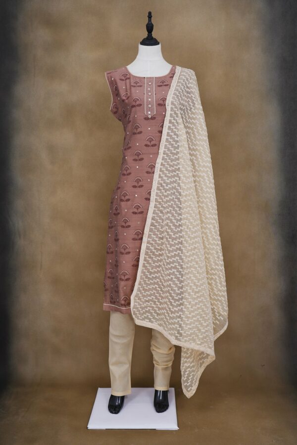 Light brown floral design top with white bottom and white shawl kurti