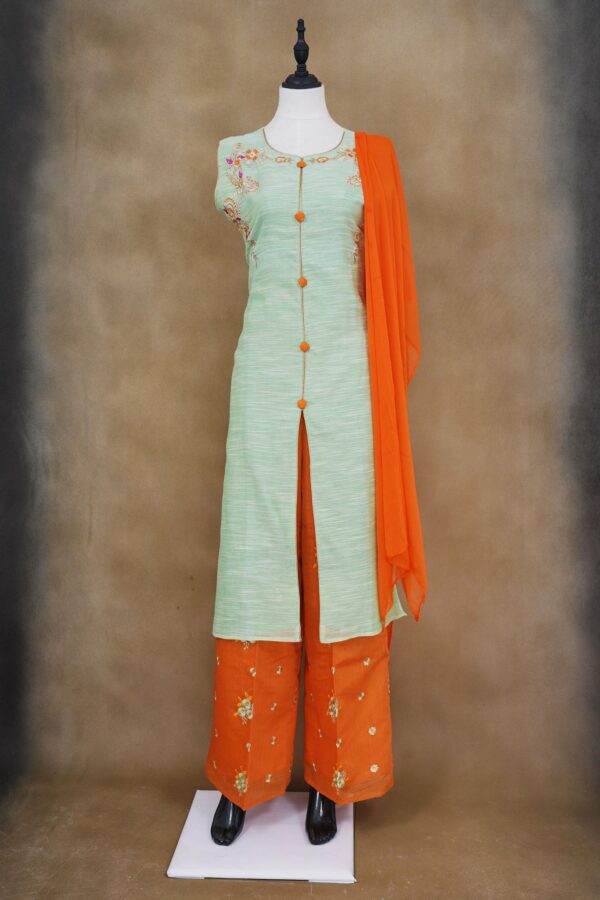 Light green floral design top with orange palazzo and orange shawl kurti