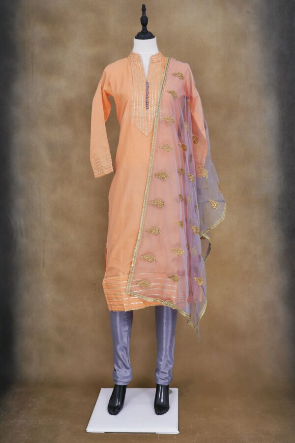 Light orange top with lavender bottom kurti