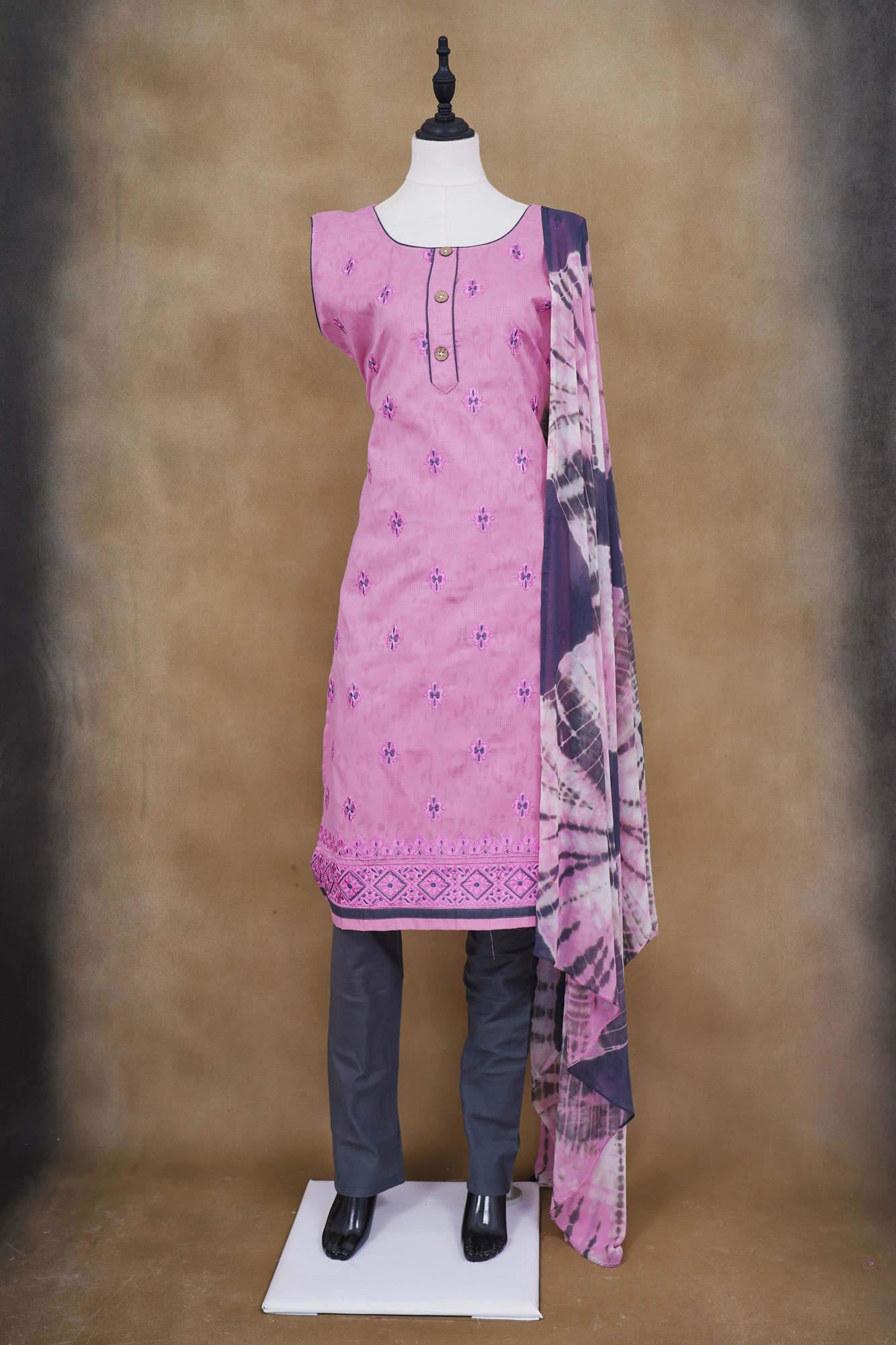 Pink floral design top with grey bottom and grey shawl kurti