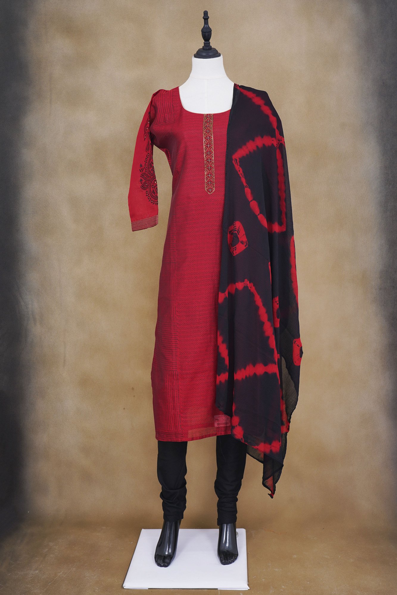 Red top with black bottom and black shawl kurti