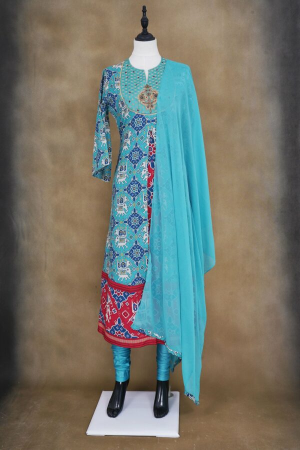 Sky blue and red design top with sky blue bottom and blue shawl kurti