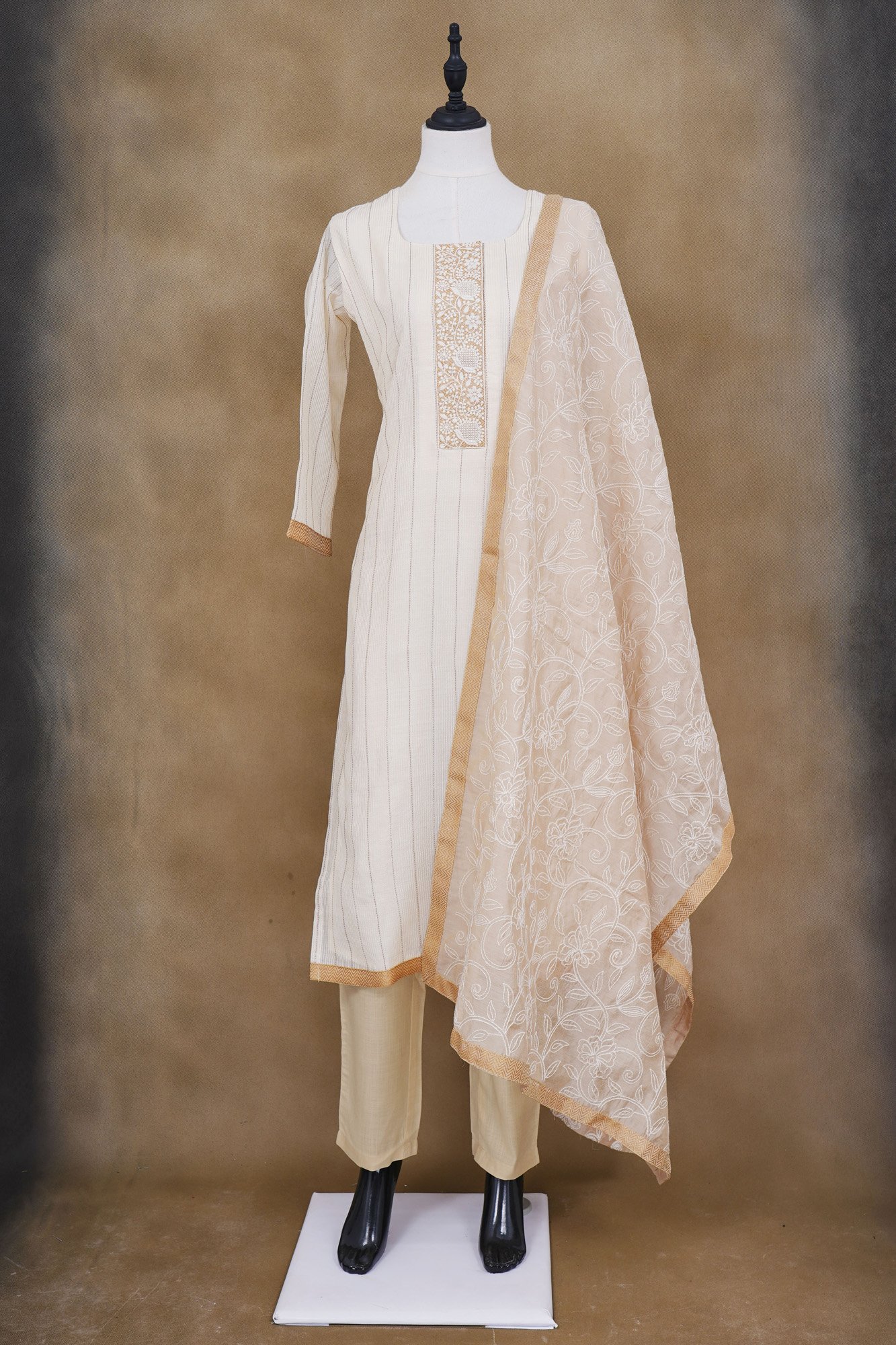 White stripe top with beige bottom and white floral shawl kurti