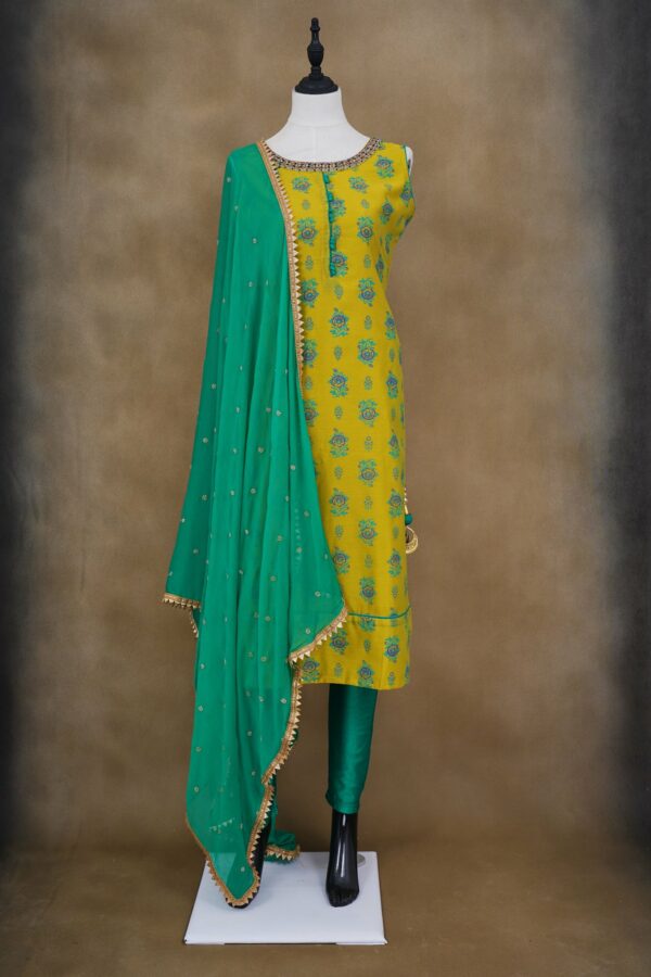 Yellow floral design top with turquoise blue bottom and turquoise blue shawl kurti