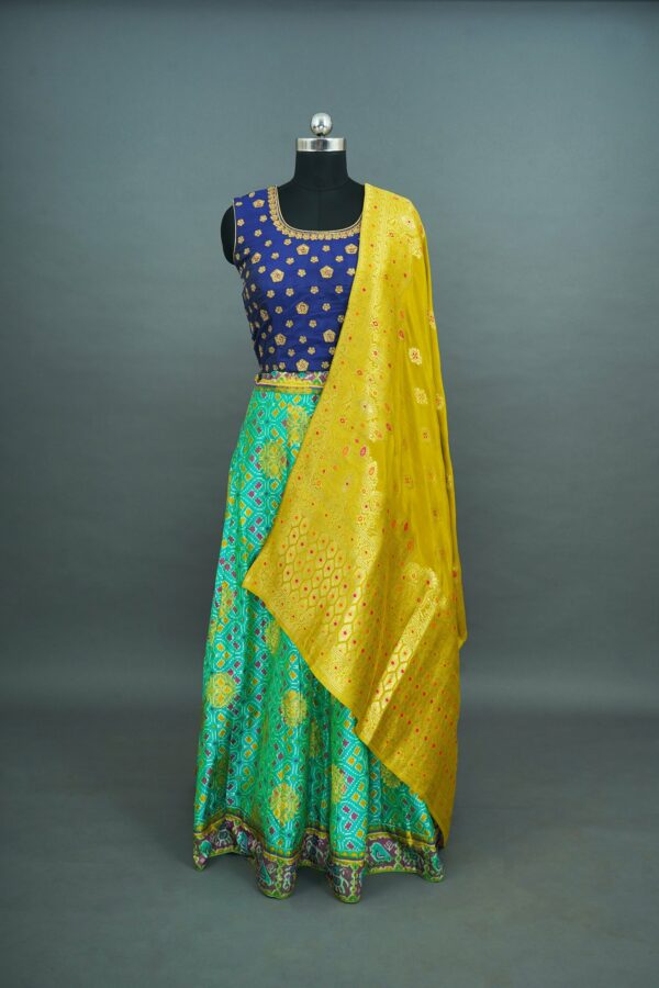 Blue top green bottom with yellow shawl lehenga