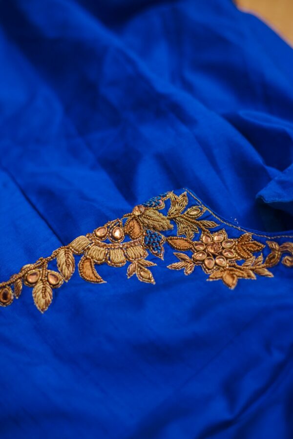 Blue lehenga with golden floral design - Image 2