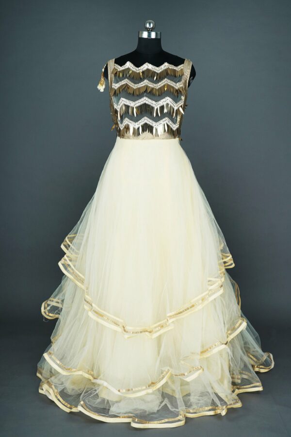 Brown design top with White net bottom Lehenga
