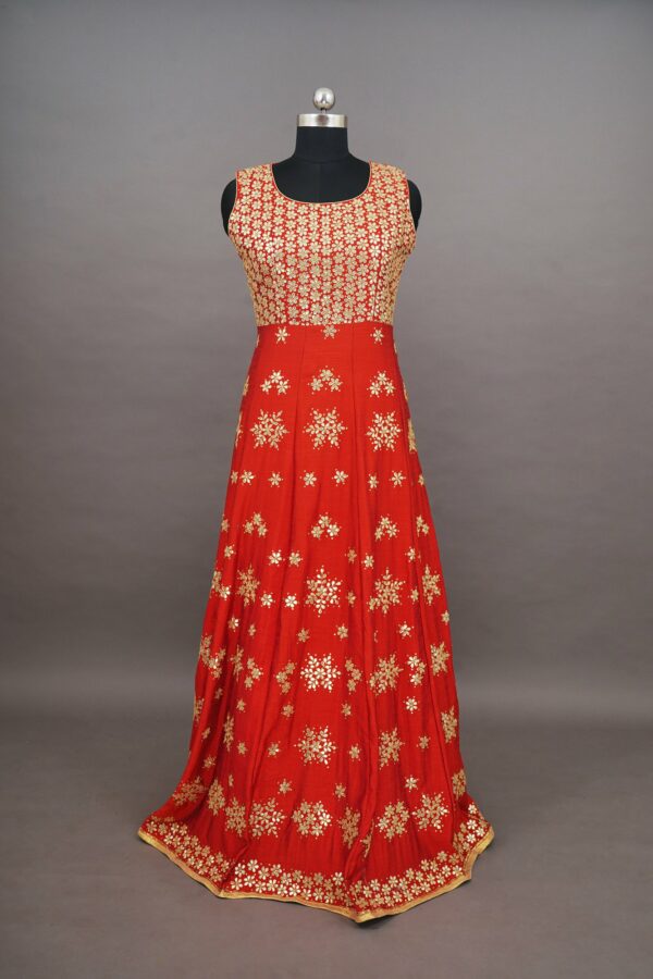 Golden floral top with red floral design bottom Lehenga