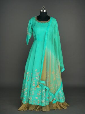 Green colour lehenga with floral design at bottom