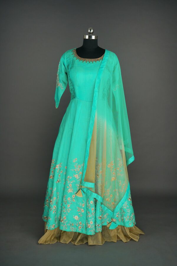 Green colour lehenga with floral design at bottom