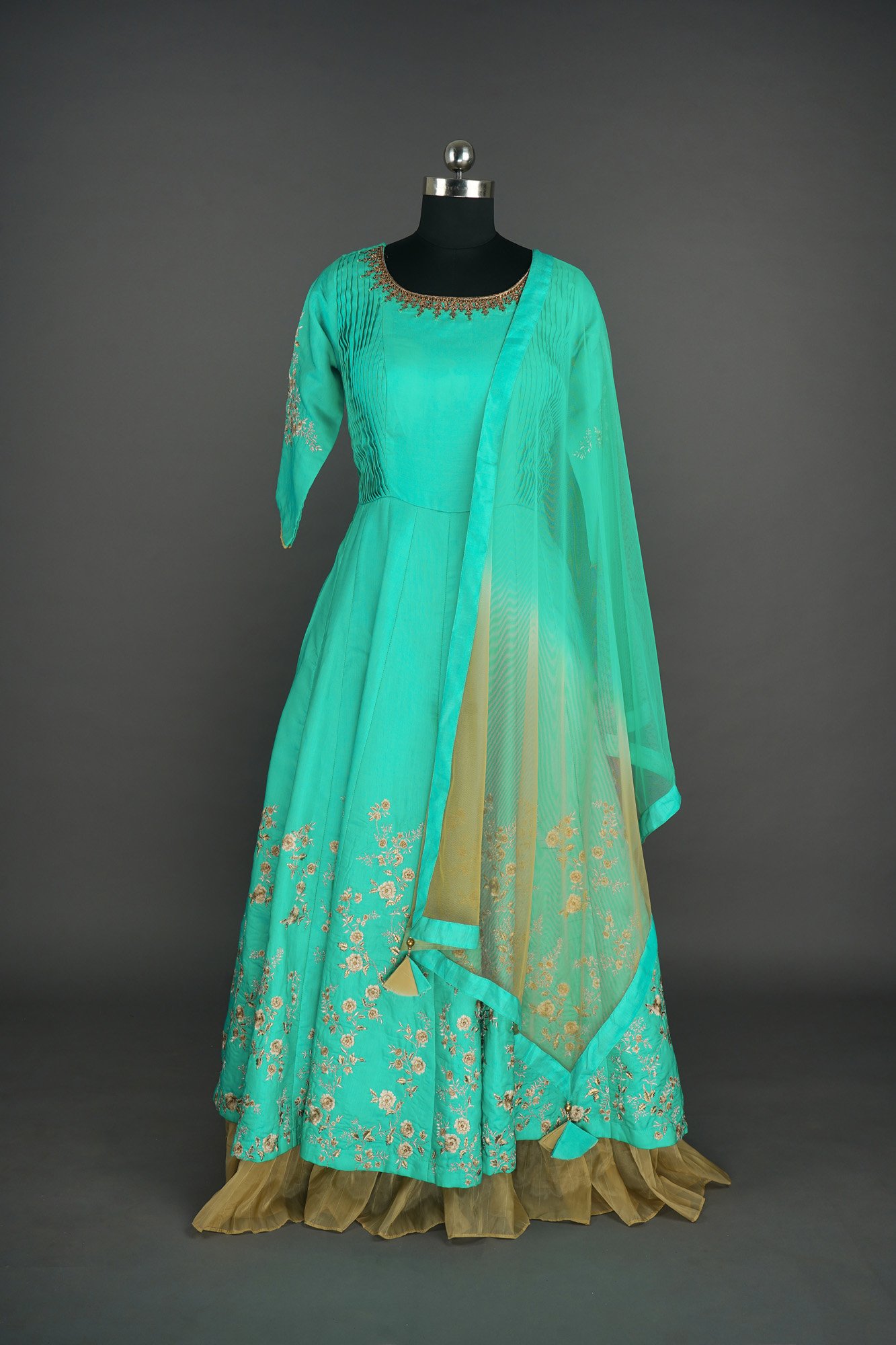 Green colour lehenga with floral design at bottom