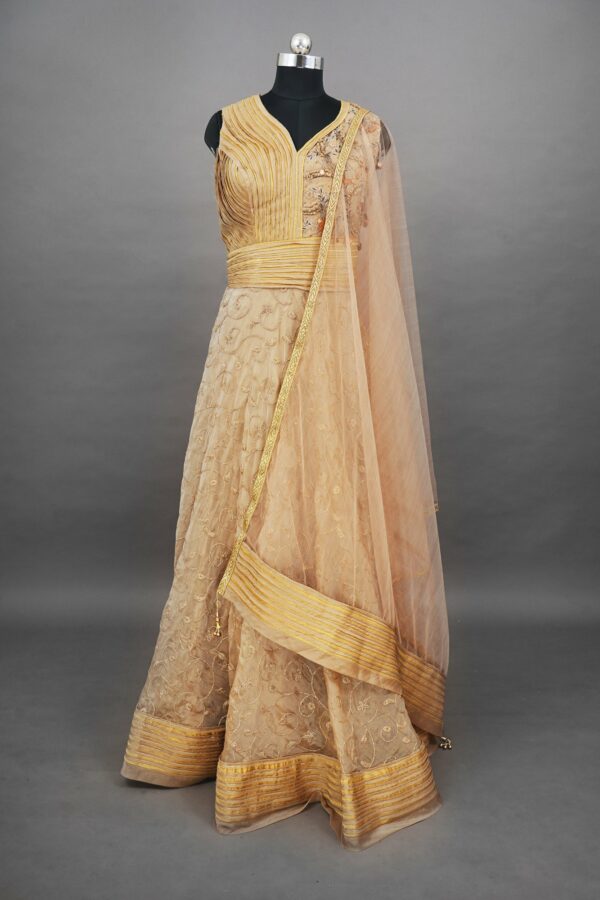 Half white lehenga with golden design