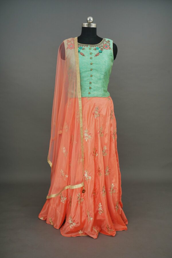Light green with floral design with light orange bottom lehenga