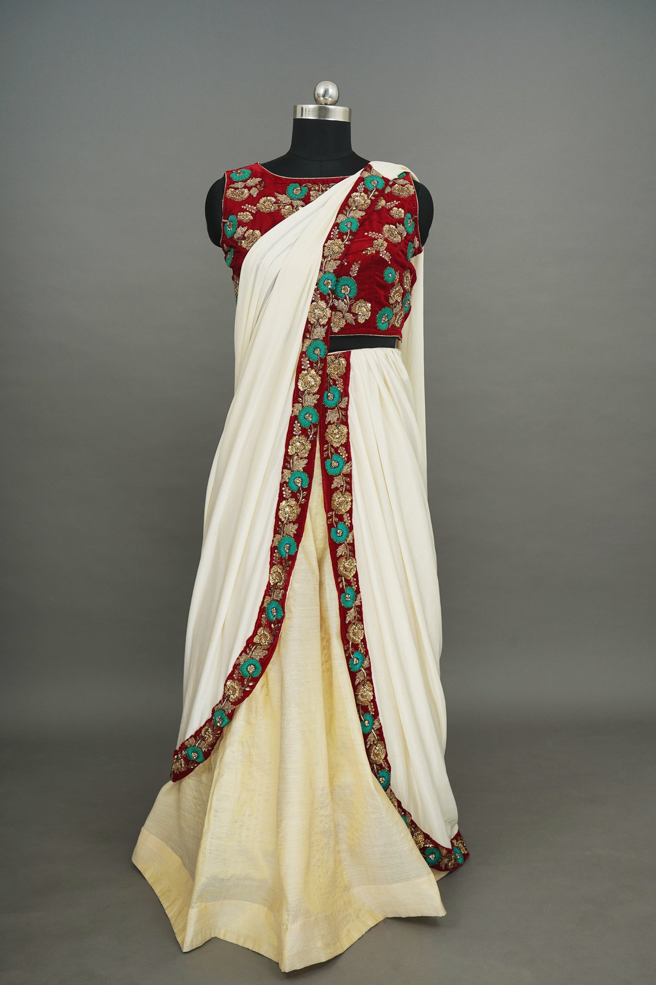 Red floral design top with white bottom lehenga