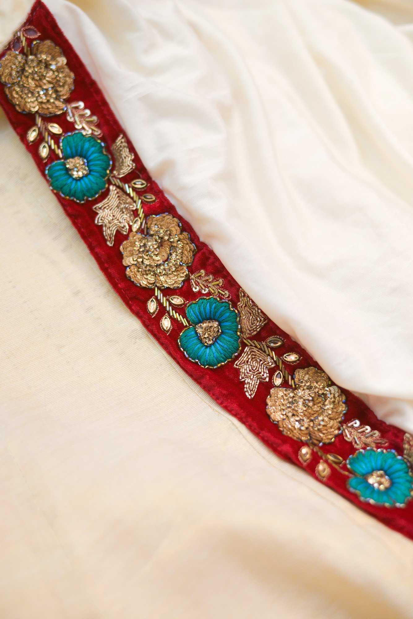 Red floral design top with white bottom lehenga - Image 2