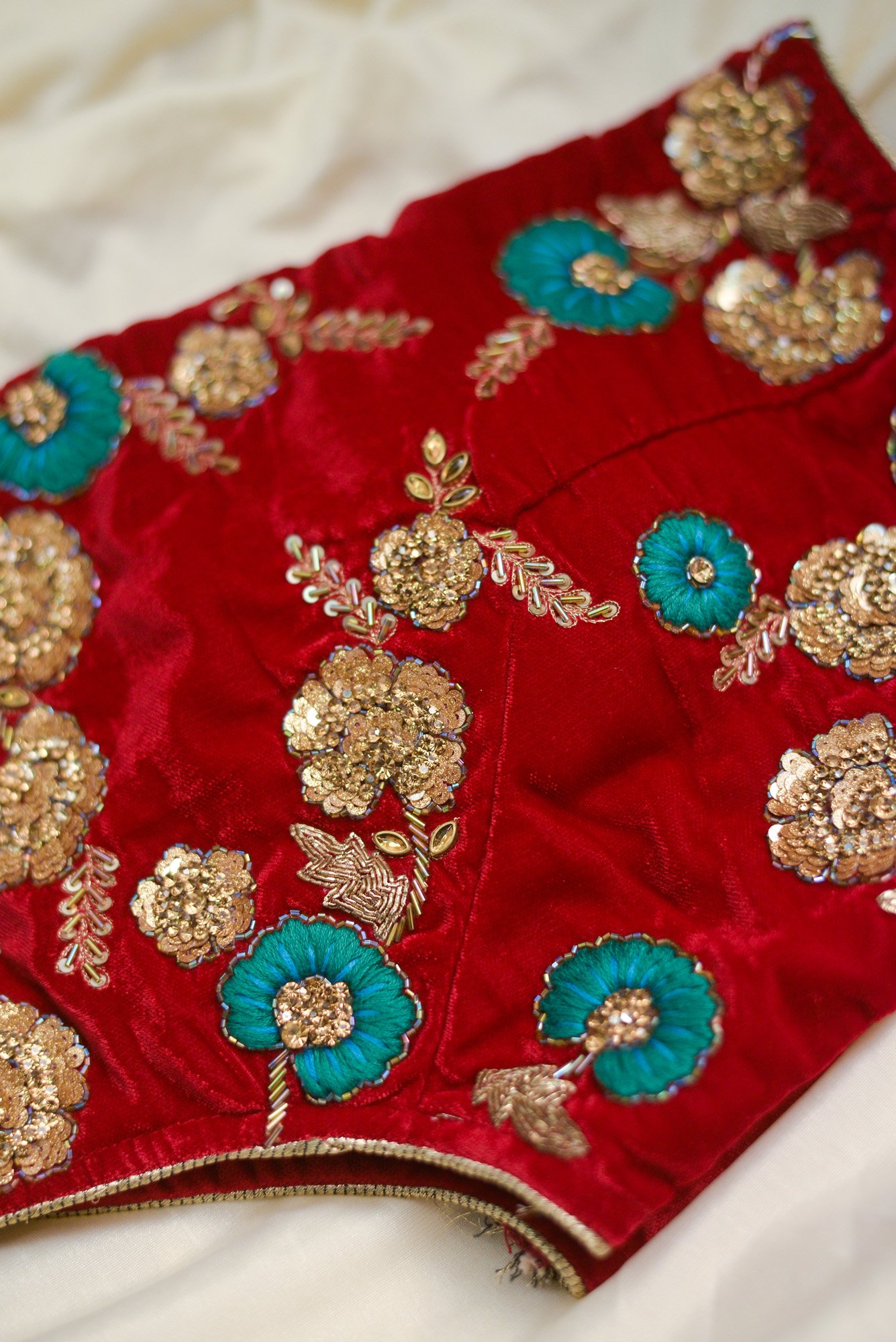 Red floral design top with white bottom lehenga - Image 3
