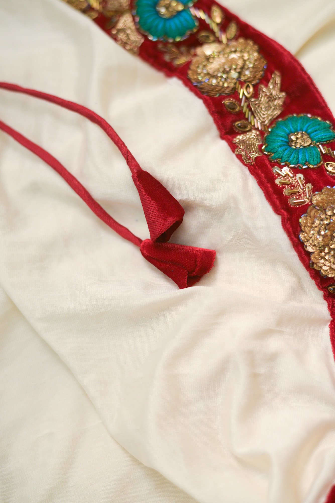 Red floral design top with white bottom lehenga - Image 4