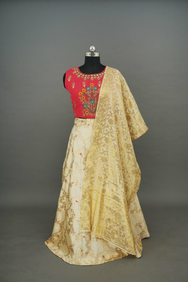 Red floral top with half white bottom lehenga