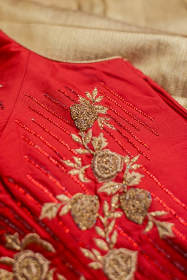 Red lehenga with floral design and golden bottom - Image 2