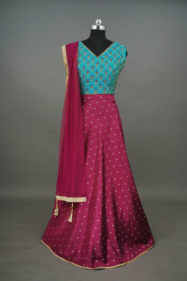Turquoise blue floral design top with magenta bottom lehenga