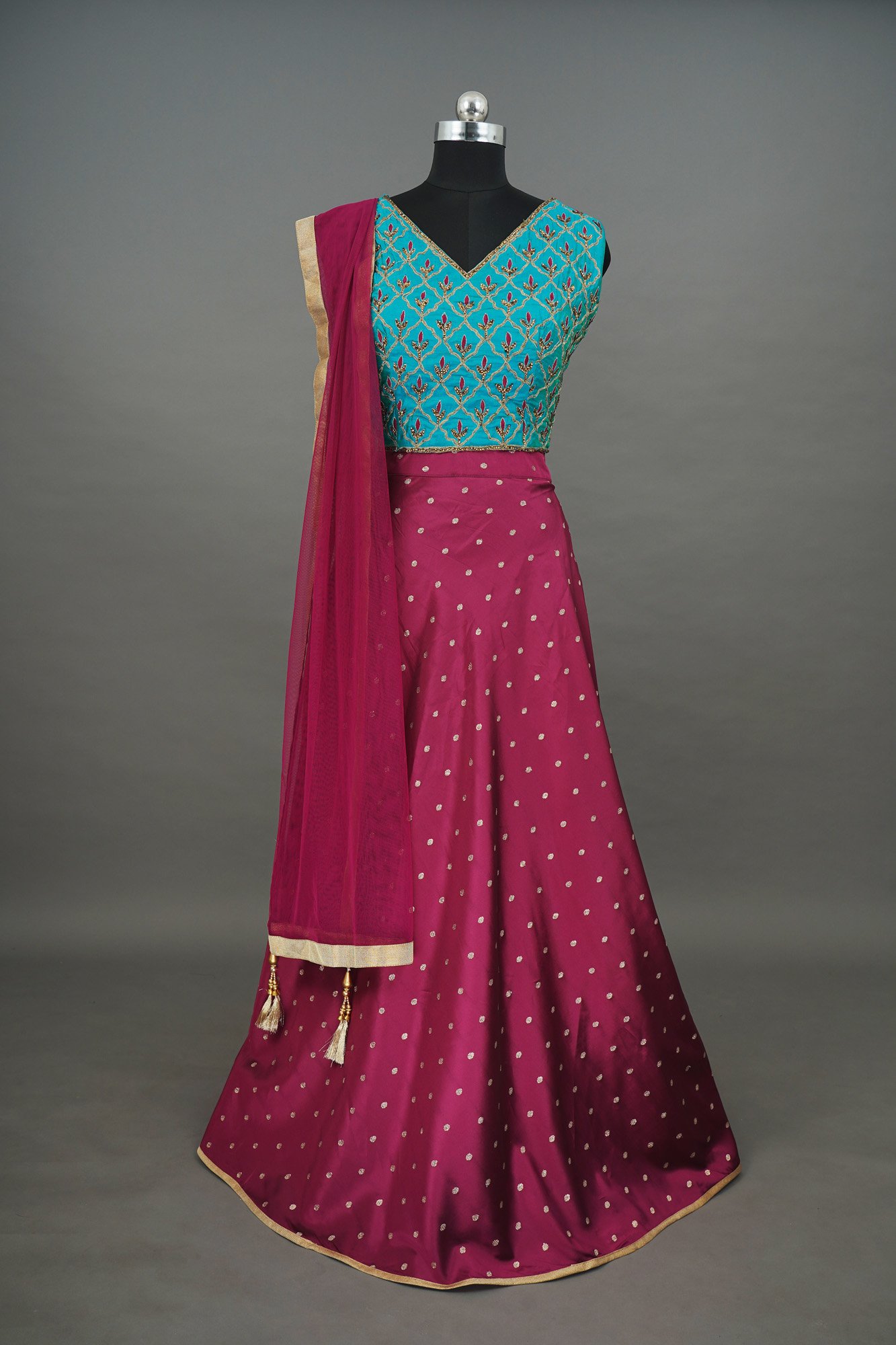 Turquoise blue floral design top with magenta bottom lehenga