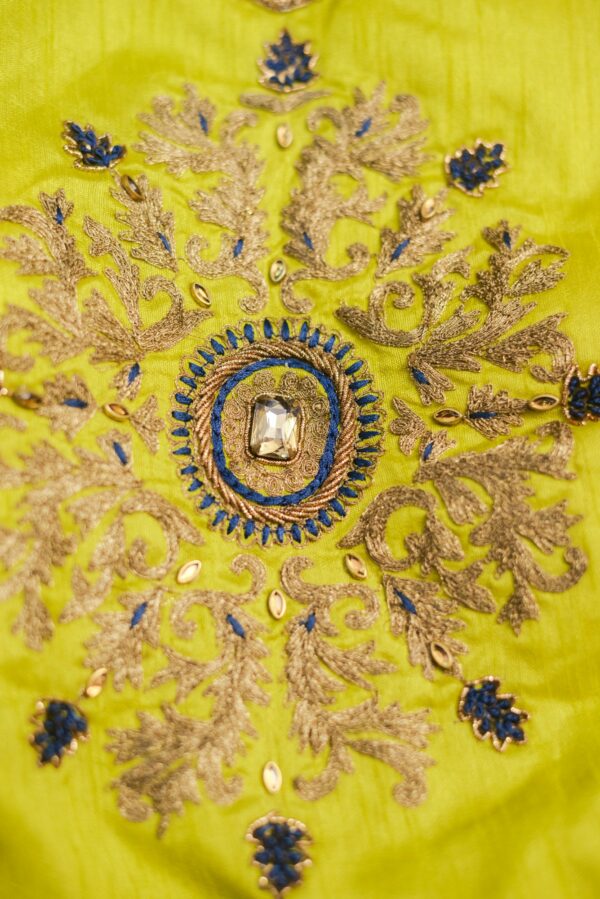Yellow floral design top with dark blue bottom and red coat lehenga - Image 3