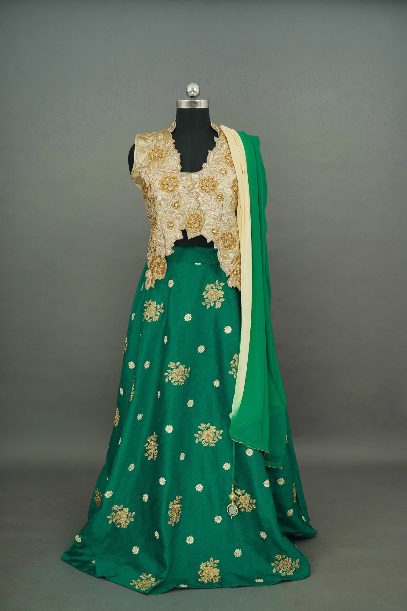 Yellow floral top with green bottom lehenga