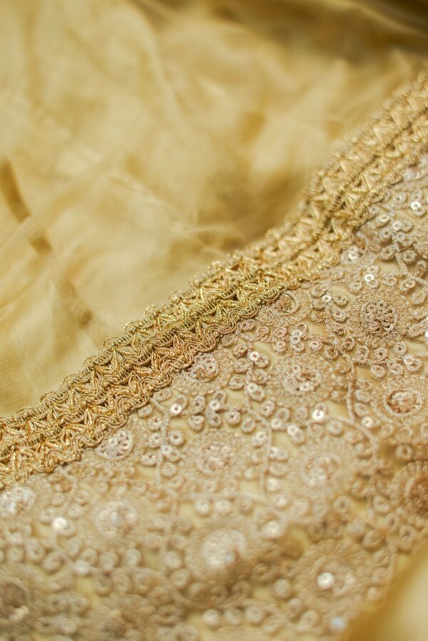 Yellow floral top with net bottom design lehenga - Image 4