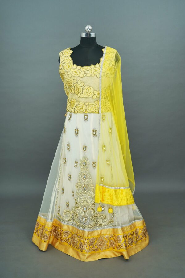 Yellow floral top with white net bottom lehenga