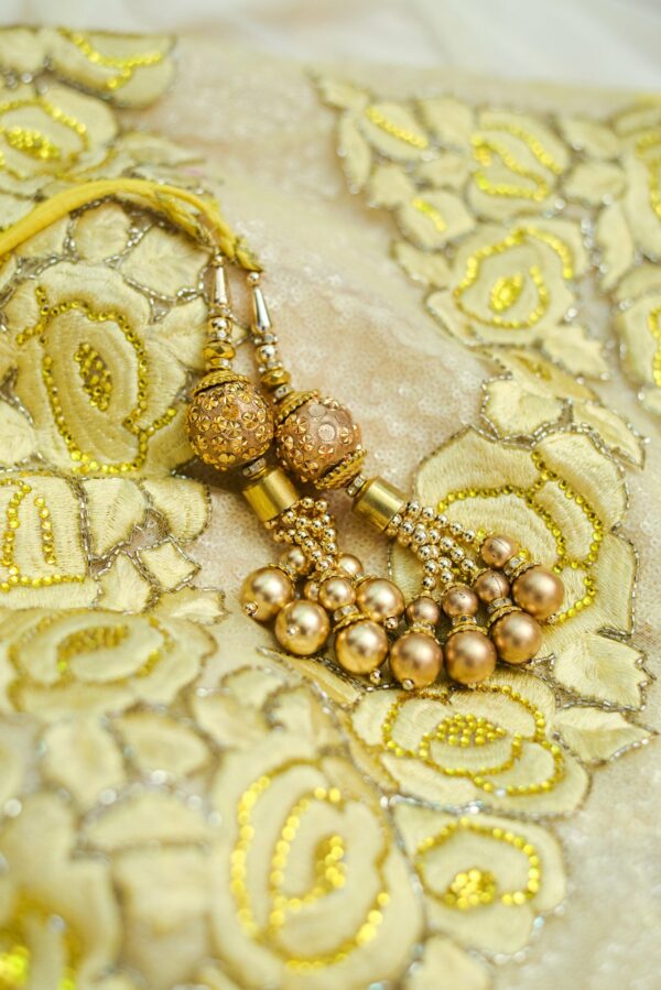 Yellow floral top with white net bottom lehenga - Image 4