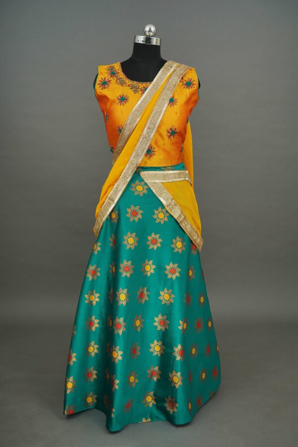 Yellow top and green bottom with floral design lehenga