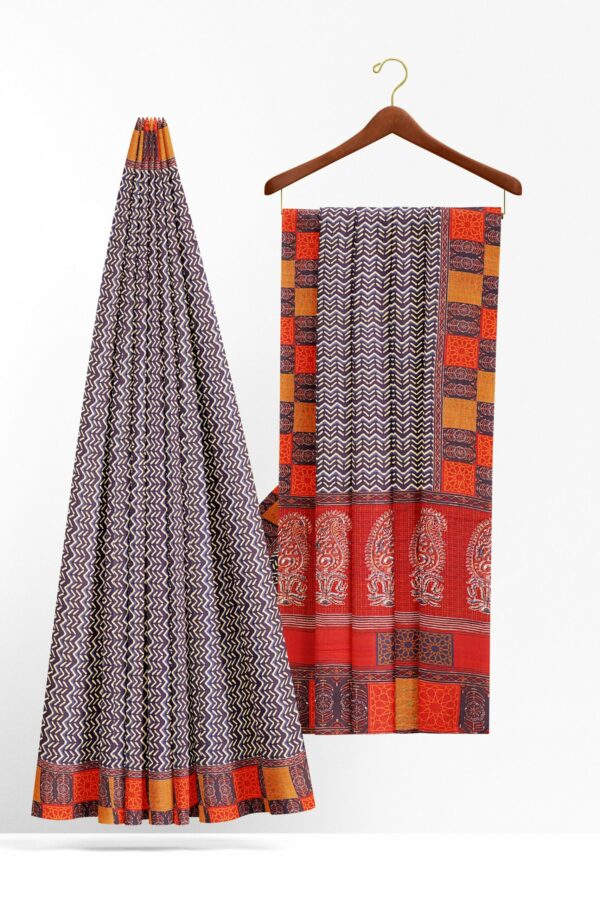 Black and white saree with red orange border