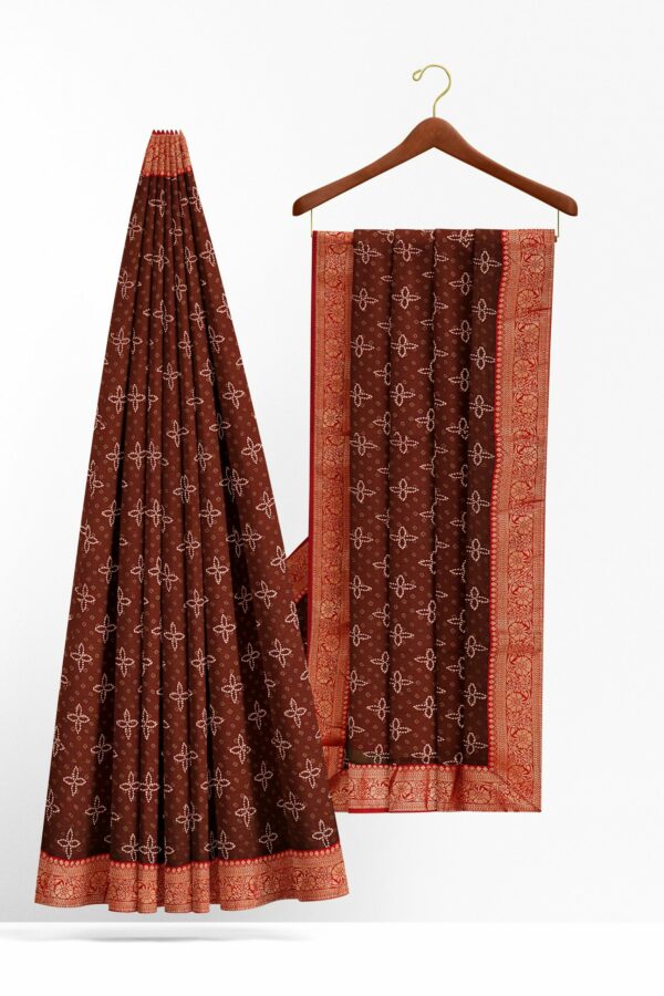 Brown saree with red golden colour border