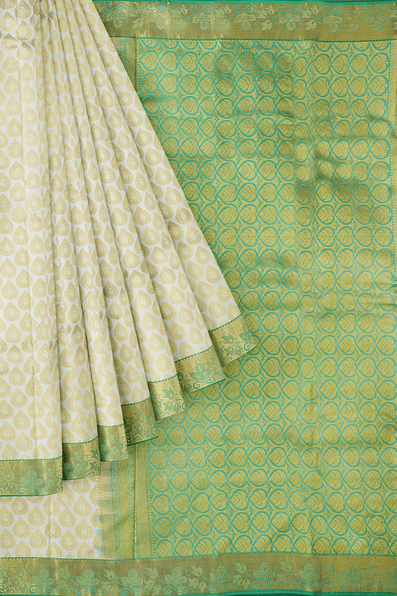 sri kumaran stores kanchipuram silk saree half white saree with golden green border 1