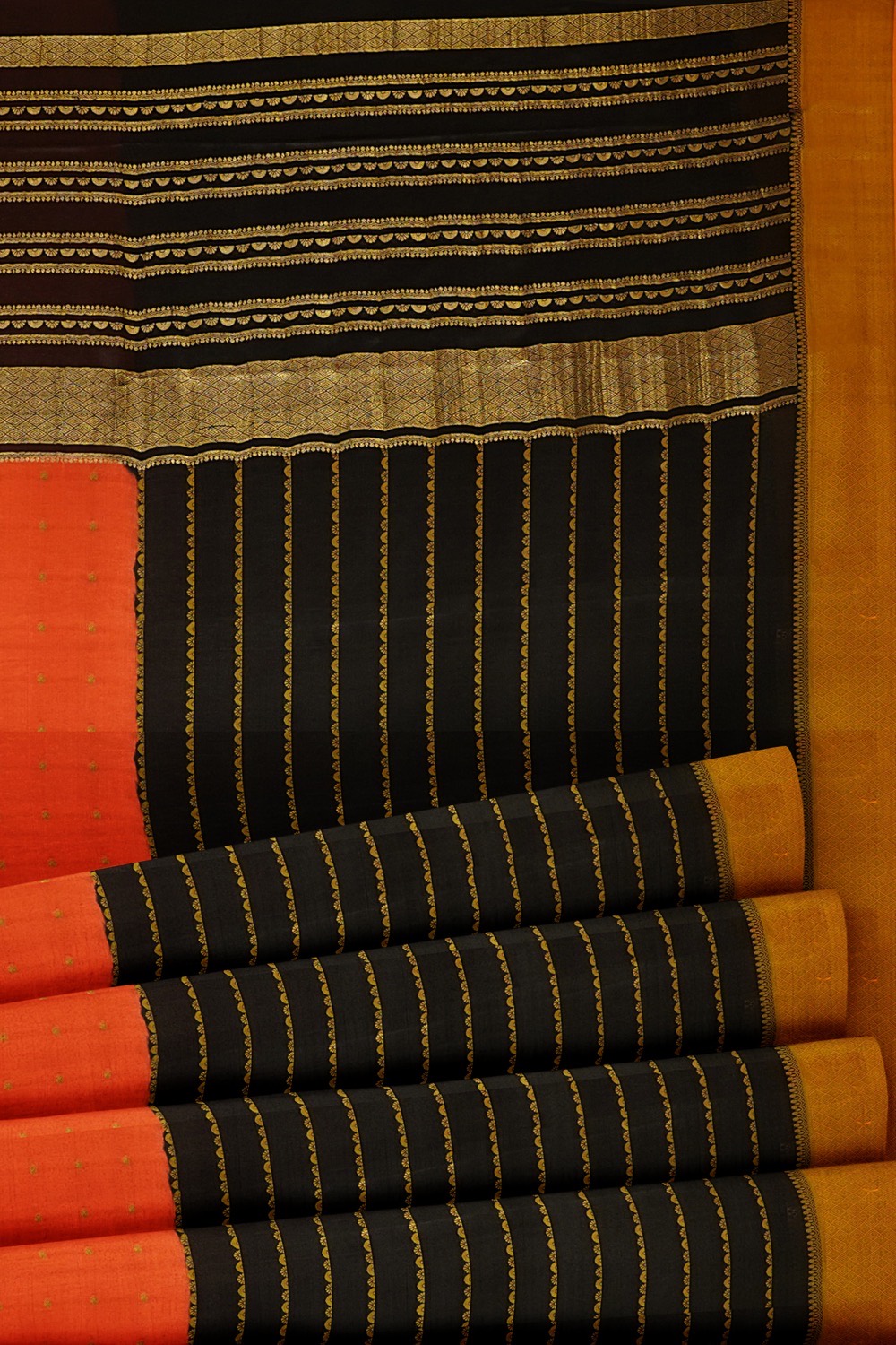 sri kumaran stores mysuru silk saree orange with black combined saree with golden zari 5