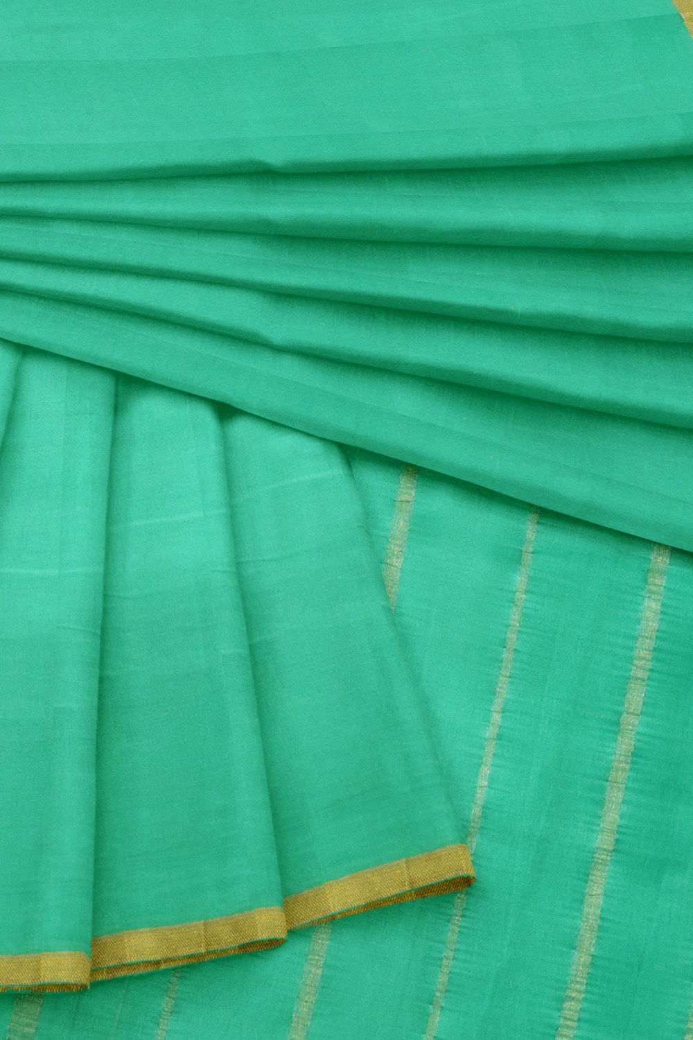 sri kumaran stores mysuru silk saree tarquoise blue plain saree with thin golden zari border 4